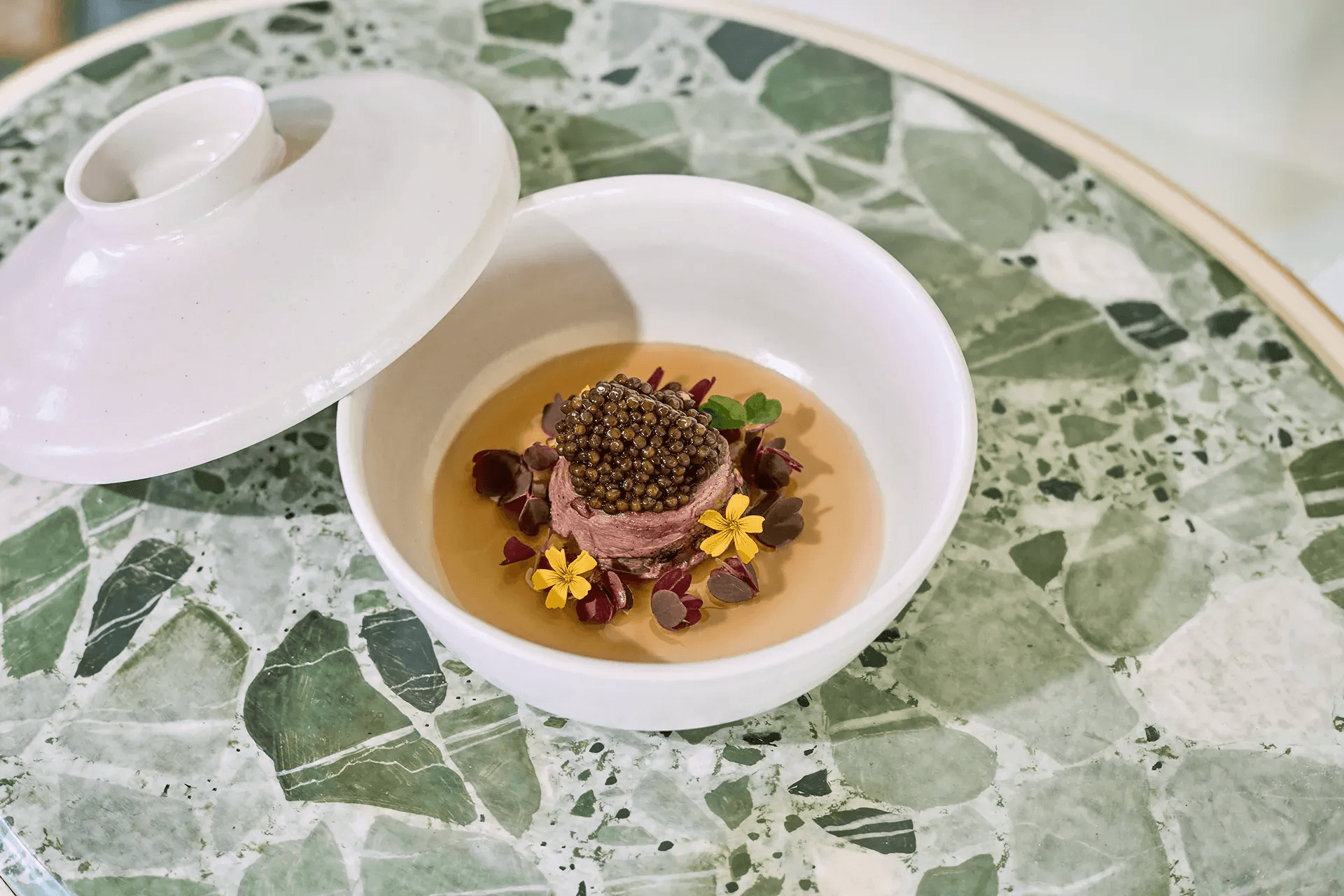 Ballotine de cerf fumé au sapin, consommé de langoustine et Rova Caviar Osciètre Suprême