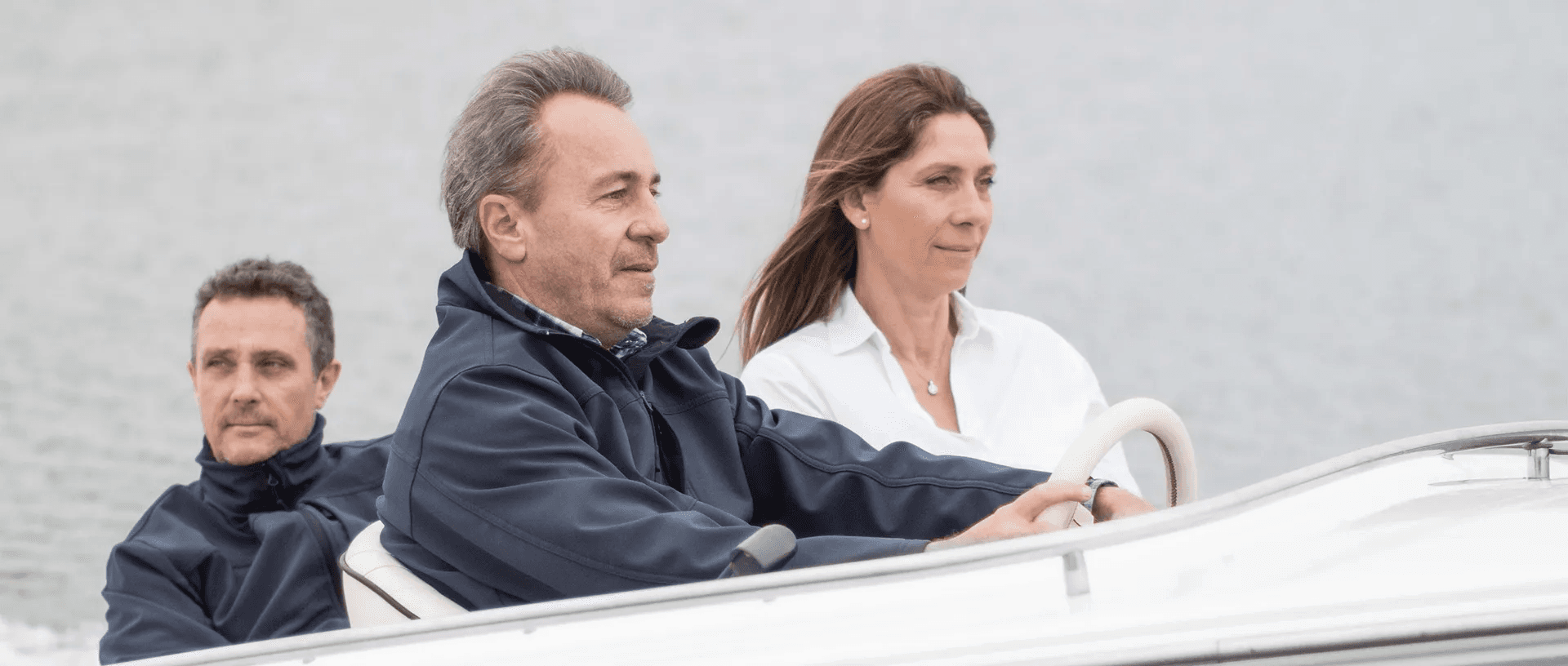 Delphyne, Christophe Dabezies, and Alexandre Guerrier, the 3 founders on a boat