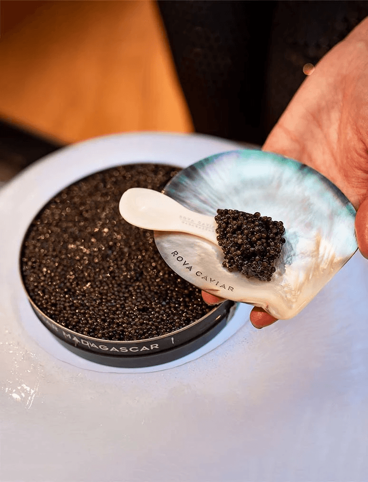 Caviar service on a mother-of-pearl dish