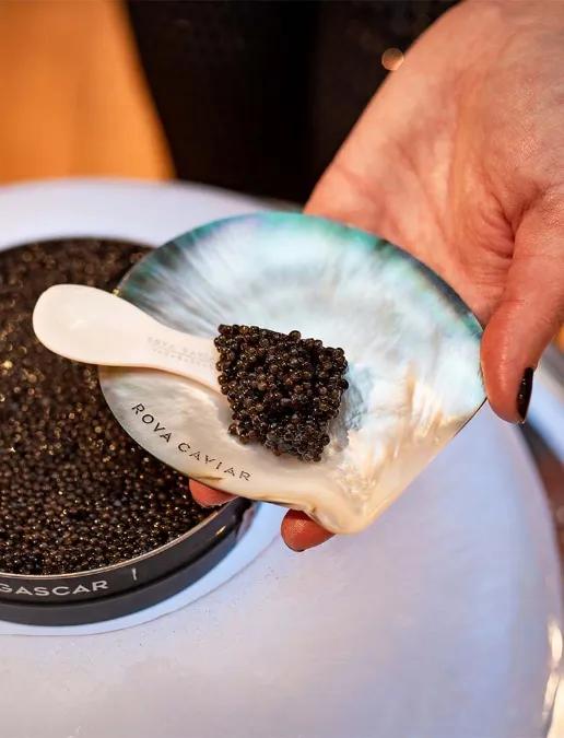 Caviar service on a mother-of-pearl dish
