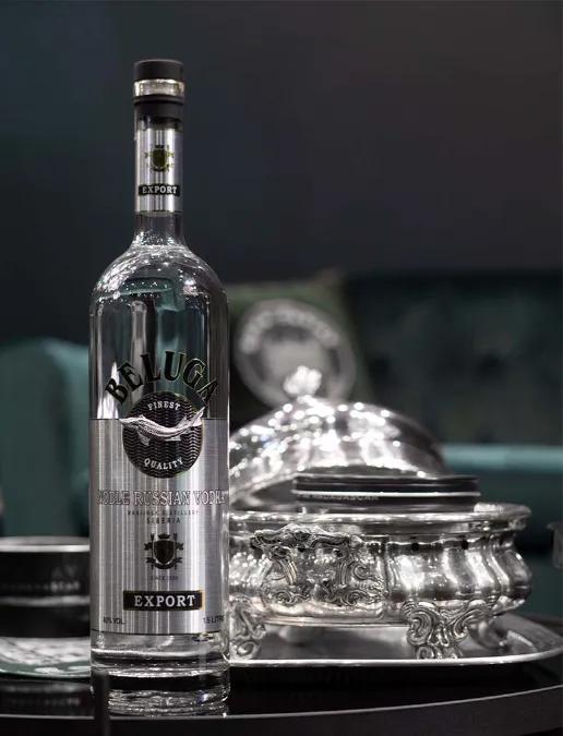 Beluga vodka bottle and silverware set